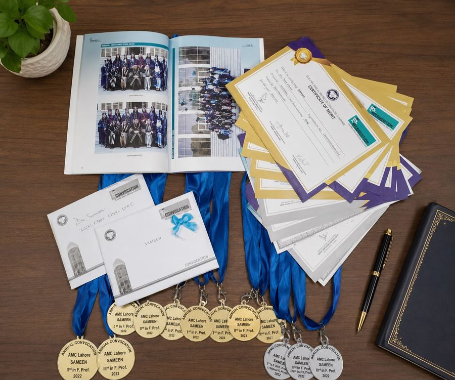 Gold and silver medals and certificates of merit awarded to Dr. Sameen by Allama Iqbal Medical College, Lahore